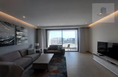 Living Room image for: Apartment - 1 Bedroom - 2 Bathrooms for rent in Amwaj Avenue - Amwaj Islands - Muharraq Governorate, Image 1