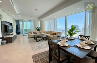 Living / Dining Room image for: Apartment - 2 Bedrooms - 3 Bathrooms for rent in Bahrain Financial Harbour - Manama - Capital Governorate, Image 1