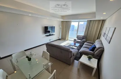 Living / Dining Room image for: Apartment - 2 Bedrooms - 3 Bathrooms for rent in Busaiteen - Muharraq Governorate, Image 1