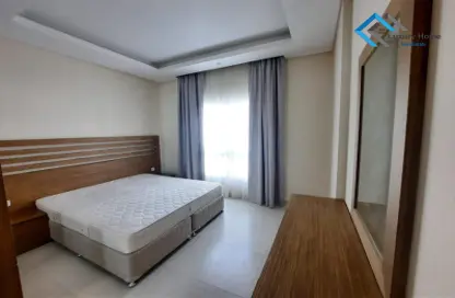 Room / Bedroom image for: Apartment - 2 Bedrooms - 3 Bathrooms for rent in Hidd - Muharraq Governorate, Image 1