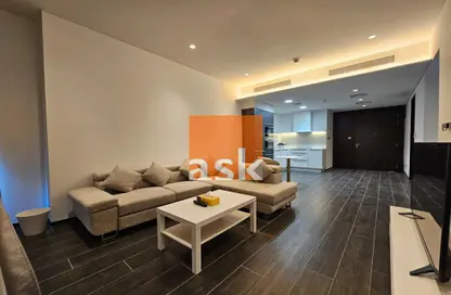 Living Room image for: Apartment - 1 Bedroom - 2 Bathrooms for sale in Bahrain Financial Harbour - Manama - Capital Governorate, Image 1