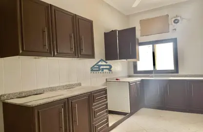 Kitchen image for: Apartment - 3 Bedrooms - 2 Bathrooms for rent in Busaiteen - Muharraq Governorate, Image 1