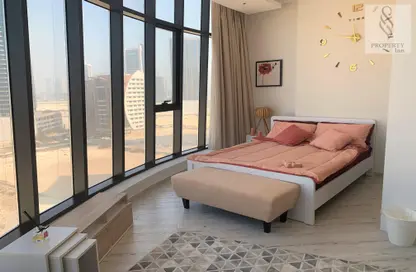 Room / Bedroom image for: Apartment - 1 Bedroom - 2 Bathrooms for sale in Seef - Capital Governorate, Image 1