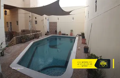 Pool image for: Villa - 7 Bedrooms - 7 Bathrooms for sale in A'Ali - Central Governorate, Image 1