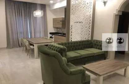 Living / Dining Room image for: Apartment - 2 Bedrooms - 2 Bathrooms for rent in Barbar - Northern Governorate, Image 1