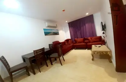 Living / Dining Room image for: Apartment - 1 Bedroom - 2 Bathrooms for rent in Al Burhama - Manama - Capital Governorate, Image 1