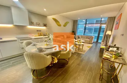 Living / Dining Room image for: Apartment - 1 Bedroom - 2 Bathrooms for sale in Bahrain Financial Harbour - Manama - Capital Governorate, Image 1