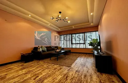 Living Room image for: Apartment - 2 Bedrooms - 3 Bathrooms for sale in Abraj Al Lulu - Manama - Capital Governorate, Image 1