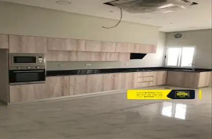 Kitchen image for: Villa - 6 Bedrooms - 7 Bathrooms for sale in Galali - Muharraq Governorate, Image 1