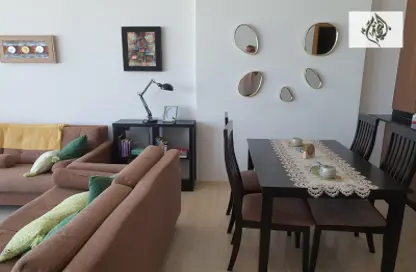 Living / Dining Room image for: Apartment - 1 Bedroom - 2 Bathrooms for rent in Dilmunia Island - Muharraq Governorate, Image 1