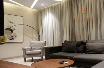 Living Room image for: Apartment - 1 Bedroom - 1 Bathroom for rent in Gudaibiya - Manama - Capital Governorate, Image 1