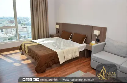 Room / Bedroom image for: Apartment - Studio - 1 Bathroom for sale in Sanabis - Manama - Capital Governorate, Image 1