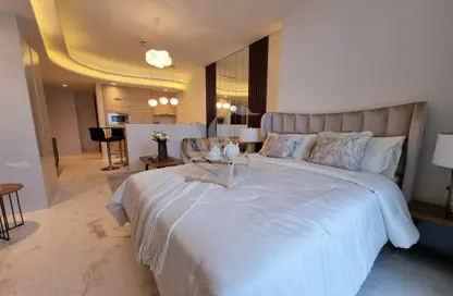 Room / Bedroom image for: Apartment - 1 Bathroom for sale in Bahrain Bay - Capital Governorate, Image 1