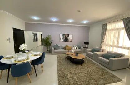 Living / Dining Room image for: Apartment - 2 Bedrooms - 3 Bathrooms for rent in Busaiteen - Muharraq Governorate, Image 1