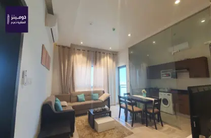 Living / Dining Room image for: Apartment - 1 Bedroom - 1 Bathroom for sale in Busaiteen - Muharraq Governorate, Image 1