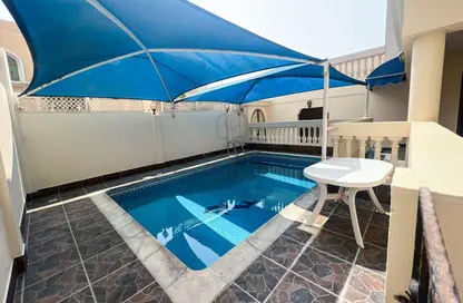 Pool image for: Villa - 4 Bedrooms - 4 Bathrooms for rent in Busaiteen - Muharraq Governorate, Image 1