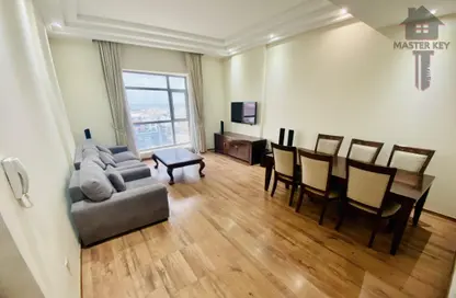 Living / Dining Room image for: Apartment - 2 Bedrooms - 3 Bathrooms for rent in Um Al Hasam - Manama - Capital Governorate, Image 1