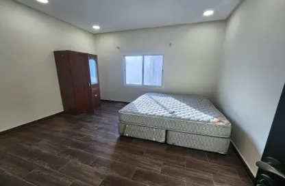 Room / Bedroom image for: Apartment - 3 Bedrooms - 4 Bathrooms for rent in Hidd - Muharraq Governorate, Image 1