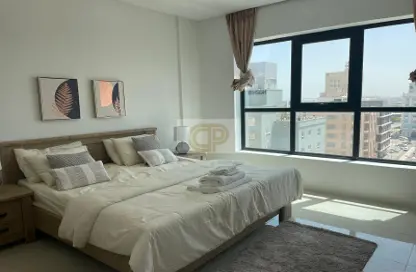 Room / Bedroom image for: Apartment - 1 Bedroom - 2 Bathrooms for rent in Sanabis - Manama - Capital Governorate, Image 1