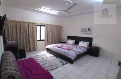 Room / Bedroom image for: Apartment - 1 Bedroom - 2 Bathrooms for rent in Mahooz - Manama - Capital Governorate, Image 1