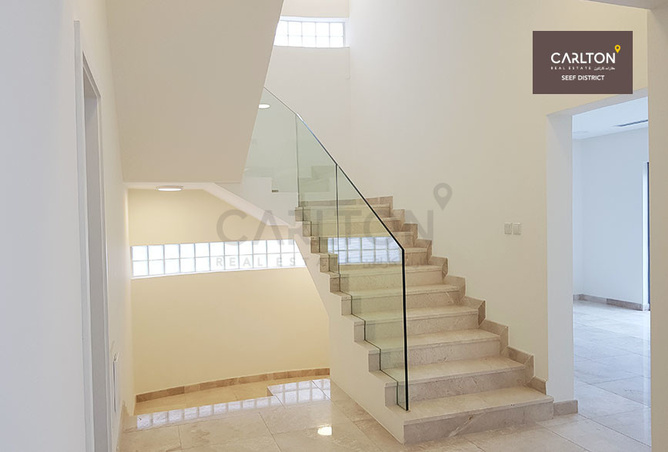 Glass Railing Stair And Light Marble Floor