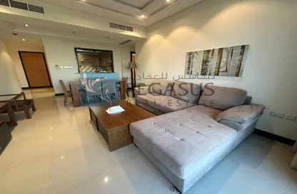 Living / Dining Room image for: Apartment - 2 Bedrooms - 2 Bathrooms for rent in Abraj Al Lulu - Manama - Capital Governorate, Image 1