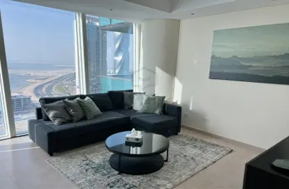 Living Room image for: Apartment - 1 Bedroom - 2 Bathrooms for rent in Bahrain Financial Harbour - Manama - Capital Governorate, Image 1