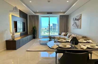 Living / Dining Room image for: Apartment - 1 Bedroom - 2 Bathrooms for rent in Canal View - Dilmunia Island - Muharraq Governorate, Image 1