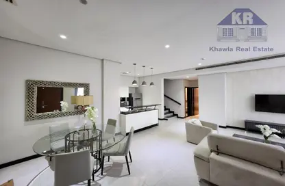 Living / Dining Room image for: Duplex - 3 Bedrooms - 4 Bathrooms for rent in Reef Island - Capital Governorate, Image 1
