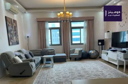 Living Room image for: Apartment - 4 Bedrooms - 3 Bathrooms for rent in Karbabad - Manama - Capital Governorate, Image 1