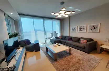 Living Room image for: Apartment - 1 Bedroom - 2 Bathrooms for sale in The Treasure - Dilmunia Island - Muharraq Governorate, Image 1
