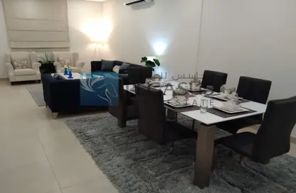 Living / Dining Room image for: Apartment - 3 Bedrooms - 4 Bathrooms for sale in Hamad Town - Northern Governorate, Image 1