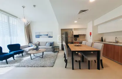 Living / Dining Room image for: Apartment - 2 Bedrooms - 2 Bathrooms for rent in Marassi Boulevard - Diyar Al Muharraq - Muharraq Governorate, Image 1