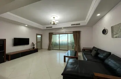Living Room image for: Apartment - 1 Bedroom - 2 Bathrooms for sale in Al Juffair - Capital Governorate, Image 1