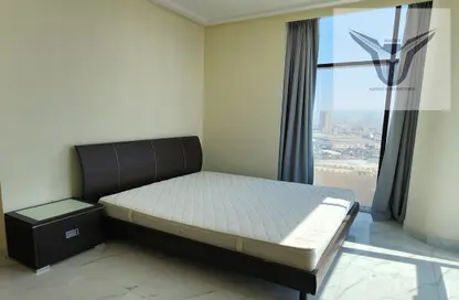 Room / Bedroom image for: Apartment - 2 Bedrooms - 2 Bathrooms for rent in Al Burhama - Manama - Capital Governorate, Image 1