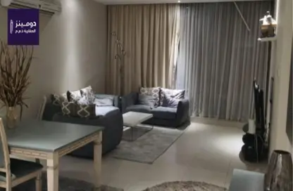 Living / Dining Room image for: Apartment - 4 Bedrooms - 5 Bathrooms for sale in Al Juffair - Capital Governorate, Image 1