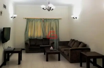 Living Room image for: Apartment - 2 Bedrooms - 2 Bathrooms for rent in Gudaibiya - Manama - Capital Governorate, Image 1