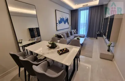 Living / Dining Room image for: Apartment - 2 Bedrooms - 3 Bathrooms for rent in Canal View - Dilmunia Island - Muharraq Governorate, Image 1