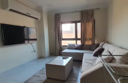 Living Room image for: Apartment - 1 Bedroom - 2 Bathrooms for rent in Hidd - Muharraq Governorate, Image 1