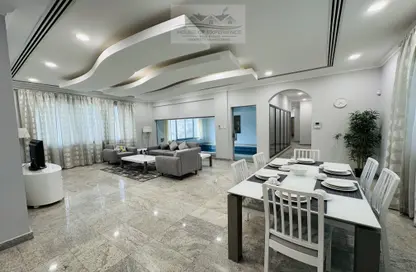 Living / Dining Room image for: Apartment - 3 Bedrooms - 4 Bathrooms for rent in Busaiteen - Muharraq Governorate, Image 1